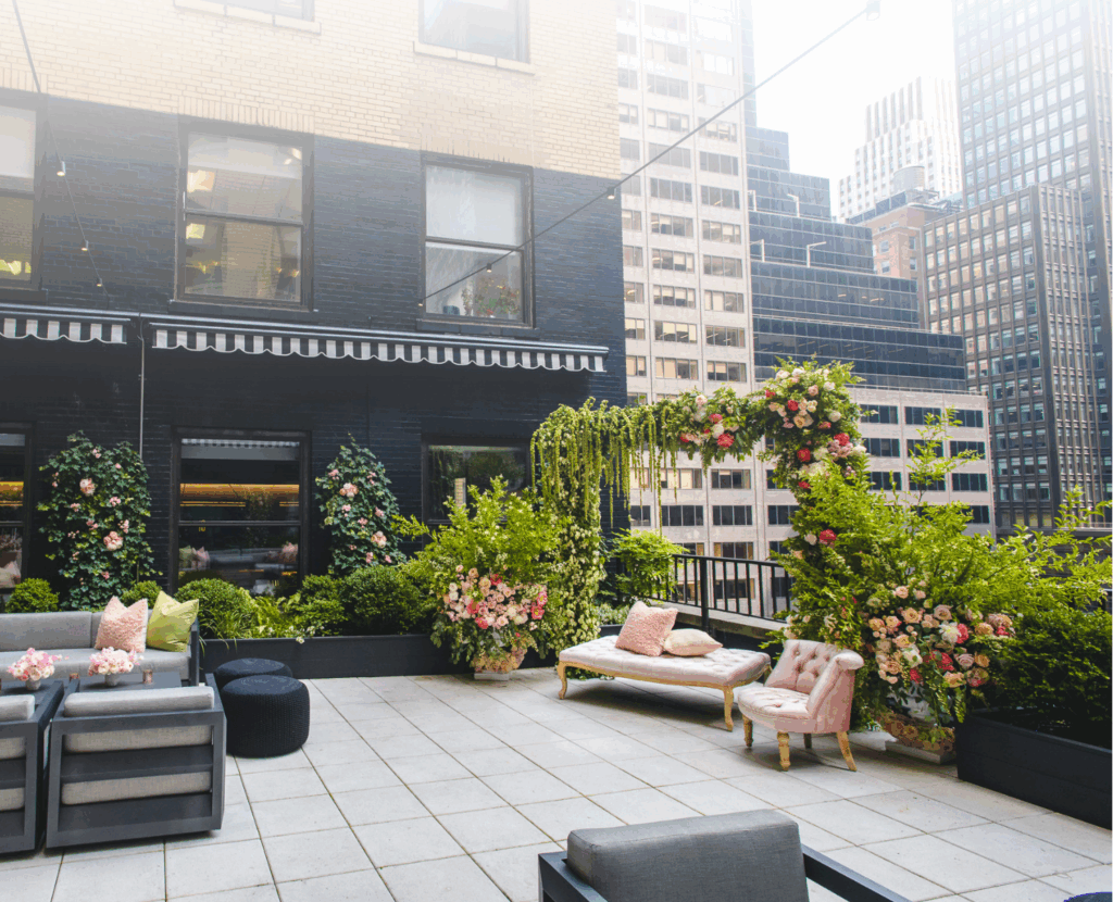 Ivy Terrace rooftop event venue in Midtown Manhattan with garden décor and city views.