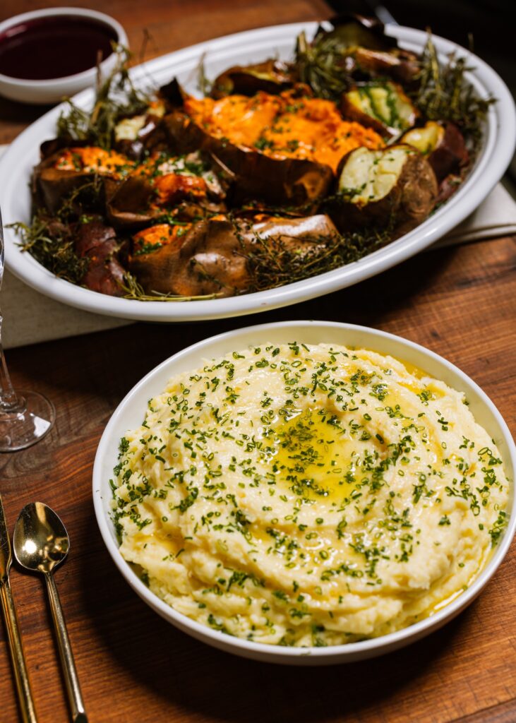 Creamy mashed potatoes served as part of an East Coast menu with fall ingredients.