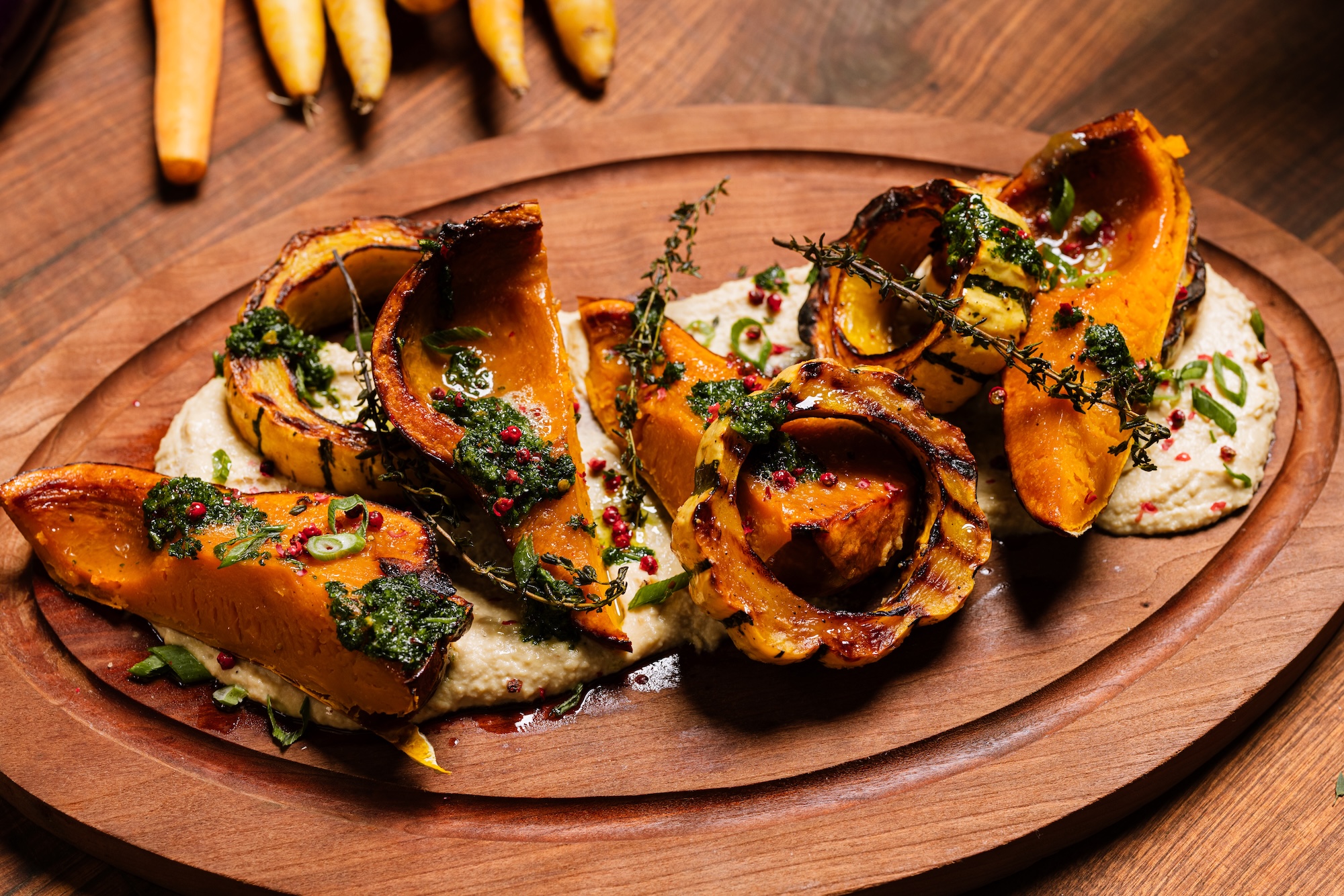 Roasted fall squash dish with herbs featured in a seasonal catering menu for a Northeast wedding.