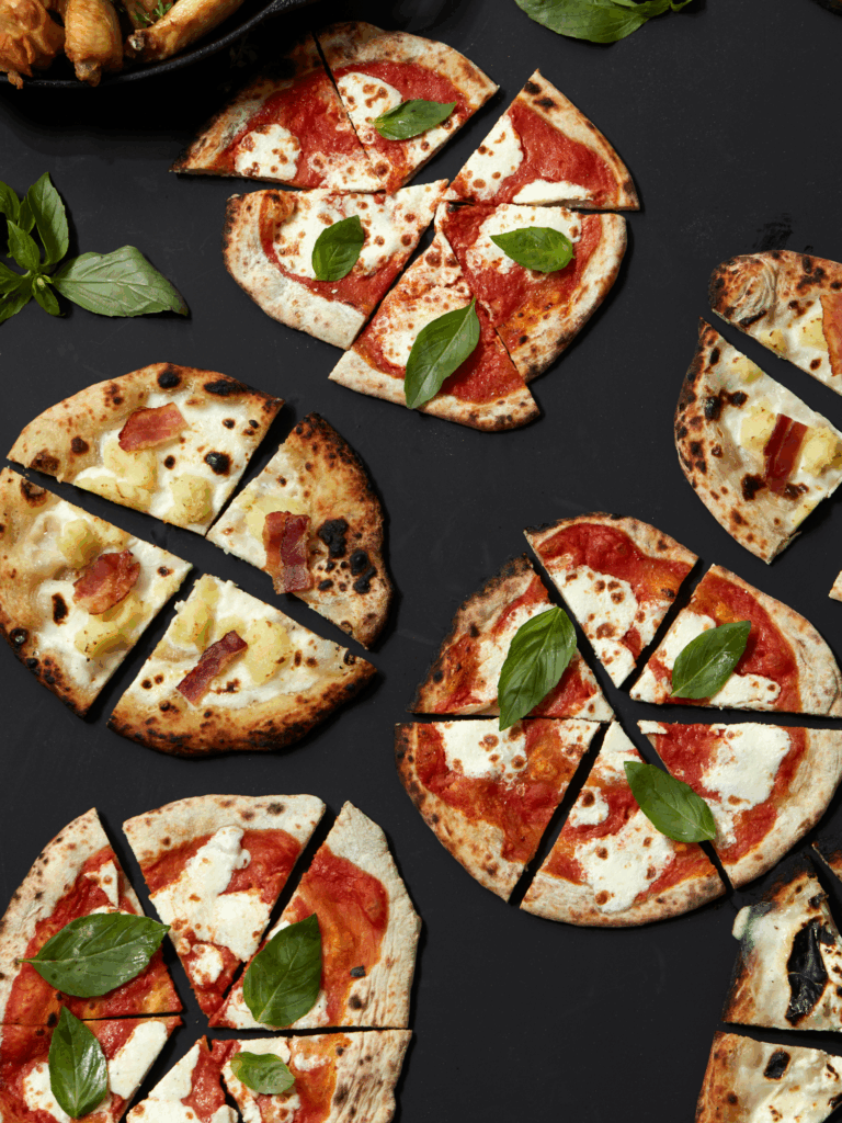Late-night wedding snack with personal pizzas served by ONTHEMARC Catering in Westchester and Fairfield County.
